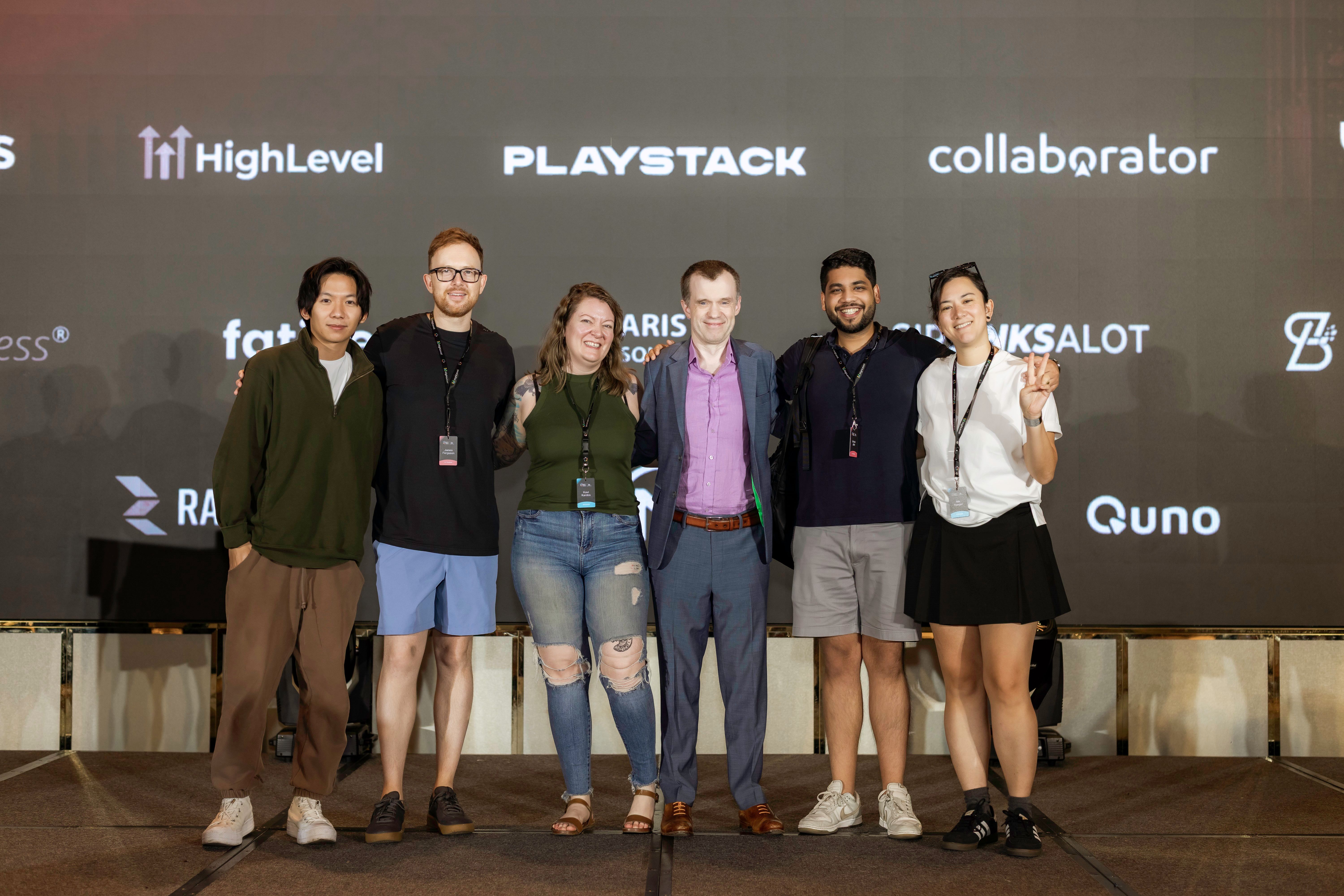 Jim Ferguson on stage with speakers at the Saigon SEO Conference, 2025